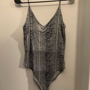 Snake skin body suit edgy